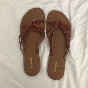 brown strappy flip flops